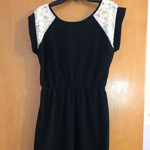 Black dress with white lace sleeves